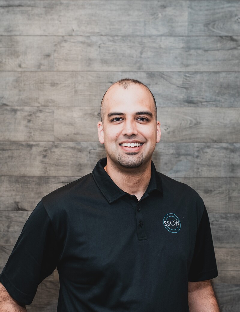 Photo of Dr. Kam Mann